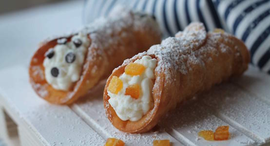 Sicilian Crunchy and Sweet Dessert: Cannoli filled with Ricotta Cheese